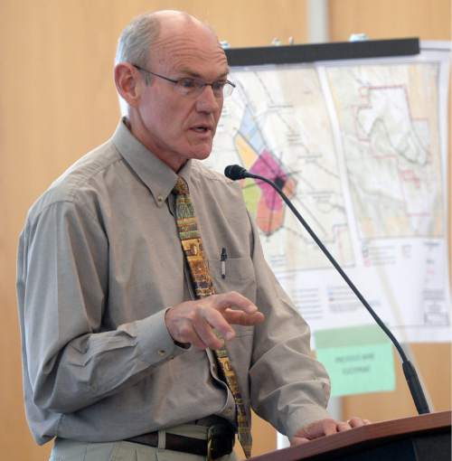 Al Hartmann |  The Salt Lake Tribune
Paul Baker with Utah Minerals Regulatory Program speaks at a crucial hearing Tuesday, June 30 at the Utah Division of Oil, Gas and Mining in Salt Lake City.