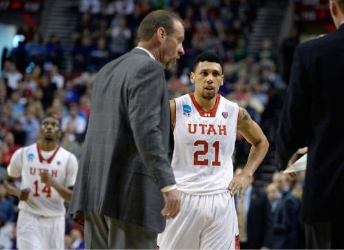 Scott Sommerdorf   |  The Salt Lake Tribune
Utah forward Jordan Loveridge (21) walks to the sidelines after fouling out during second half play. Utah defeated Stephen F. Austin 57-50 at the Moda Center in Portland, Thursday, March 19, 2015.
