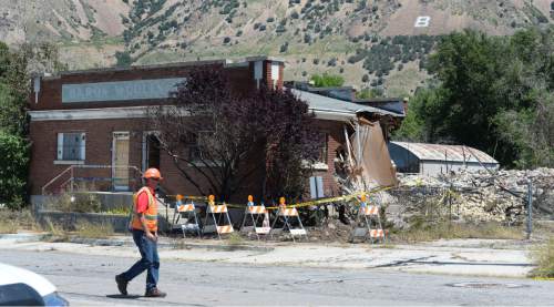 Steve Griffin  |  The Salt Lake Tribune


Crews start to clear what is left of the Baron Woolen Mills building in Brigham City, Utah after an early Monday morning fire destroyed the building July 20, 2015.