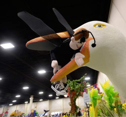 Al Hartmann  |  The Salt Lake Tribune
The Salt Lake Big Cottonwood Stake float, "Challenges and Miracles of the Frontier," features a friendly looking cricket in the beak of a friendly seagull. Thousands attended the Pioneer Day Float Preview Party at the South Towne Exposition Center in Sandy on Tuesday. This year's Days of '47 theme is "Pioneers: Forging a New Frontier."