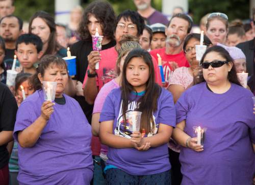 Rick Egan  |  The Salt Lake Tribune

Friends and family of Kailey Vijil gather for a candle light vigil, in memory of the 12-year-old West Valley City girl who died earlier this week, Sunday, July 19, 2015.
