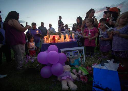Rick Egan  |  The Salt Lake Tribune

Balloons, stuffed animals and other mementos were placed in remembrance of Kailey Vijil, at a candle light vigil, in memory of the 12-year-old West Valley City girl who died earlier this week, Sunday, July 19, 2015.