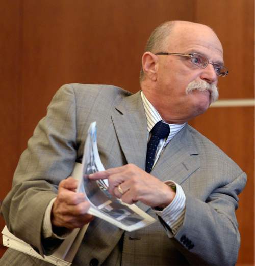 Al Hartmann  |  The Salt Lake Tribune
Defense lawyer Ron Yengich gives his closing arguments in Judge L. Douglas Hogan's courtroom in West Jordan Wednesday July 22 for his client, John Carrel,  a former Canyons School District bus driver who is charged with sexually molesting two 5-year-old girls who rode on his bus.