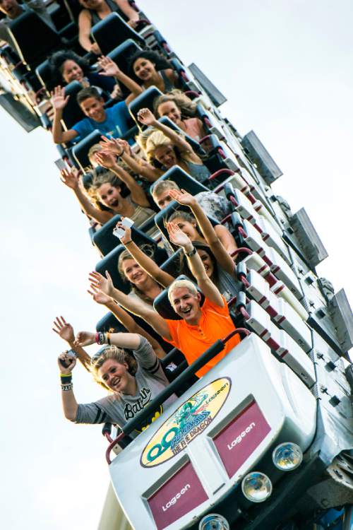 Chris Detrick  |  The Salt Lake Tribune
Johnnie Norton, 29, of Layton, rides Colossus the Fire Dragon at Lagoon Tuesday July 7, 2015.  Norton, a roller coaster enthusiast, has ridden 87 coasters in the country.