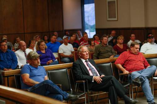 Frank J Bott  |  Special to the Tribune 

Tooele County residents listen to Tooele County Commissioners talk about the reason they think commissioners should get a pay increase.