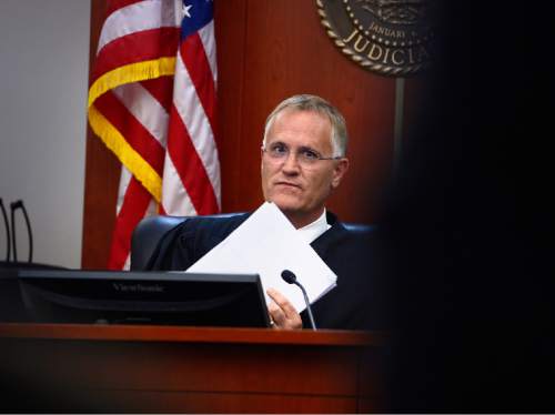 Scott Sommerdorf   |  The Salt Lake Tribune
Third District Juvenile Court Judge James Michie addresses the need to schedule the next hearing in the judicial process for the 15-year-old boy accused of killing Kailey Vijil, Wednesday, July 22, 2015.