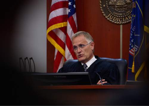 Scott Sommerdorf   |  The Salt Lake Tribune
Third District Juvenile Court Judge James Michie speaks on Wednesday directly to the 15-year-old boy accused of killing Kailey Vijil, and asks him if he understands what he is hearing.