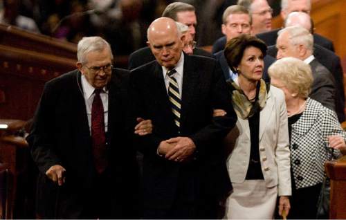 Jeremy Harmon  |  The Salt Lake Tribune

Elder Dallin H. Oaks, center, helps President Boyd K. Packer to his wheelchair following the Saturday morning session of the 181st Semiannual General Conference of The Church of Jesus Christ of Latter-day Saints on Saturday, Oct. 1, 2011.