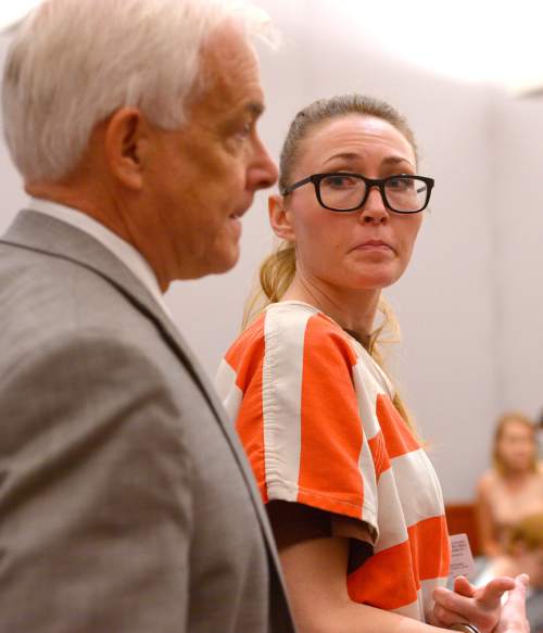 Leah Hogsten  |  The Salt Lake Tribune
Brianne Altice looks to her attorney Ed Brass moments after she is sentenced to up to 30 years, Thursday, July 9, 2015 in Judge Thomas L. Kay's Second District Courtroom.  Altice, a former Davis High school teacher had sexual relationships with three of her students.