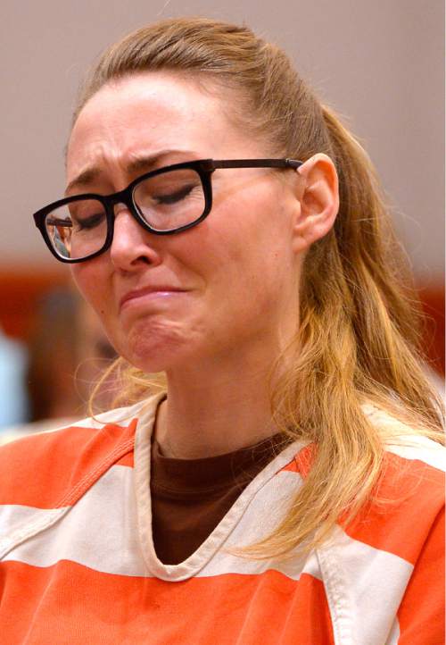 Leah Hogsten  |  The Salt Lake Tribune
Brianne Altice reacts as victim #1's mother recounts the day her son told her," I have the coolest English teacher, I feel like she really gets me," before Judge Thomas L. Kay. Brianne Altice was sentenced to up to 30 years, Thursday, July 9, 2015 in Judge Thomas L. Kay's Second District Courtroom.  Altice, a former Davis High school teacher had sexual relationships with three of her students.