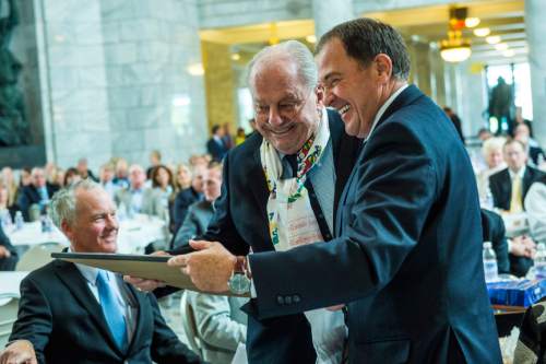 Tribune file photo by Chris Detrick

Snowbird Ski & Summer Resort co-founder Dick Bass, left, is honored by Gov. Gary Herbert at the State Capitol on June 18, 2014, which Herbert declared as "Dick Bass Day" in Utah. Seated behind Bass is Snowbird President Bob Bonar.