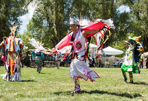 Rick Egan  |  The Salt Lake Tribune
Jennilee Kanosh, LaVerkin, from the Piaute tribe, dances in the Days of '47 Pow Wow, at Liberty Park on Friday.