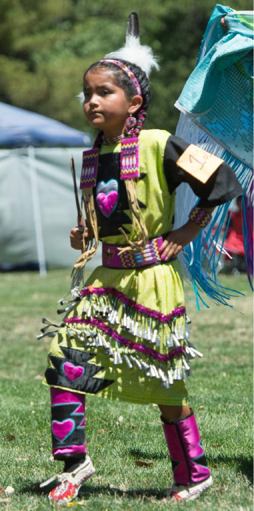 Rick Egan  |  The Salt Lake Tribune

Jace Denny, 8, dances at the Days of '47 Pow Wow, at Liberty Park, Friday, July 24, 2015.