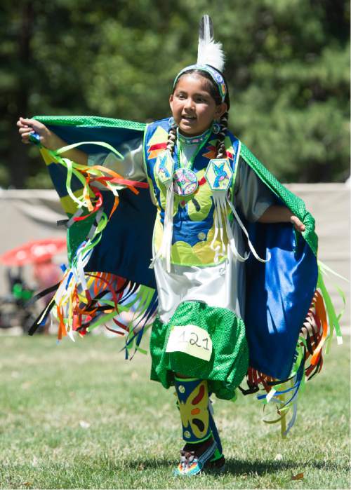 Rick Egan  |  The Salt Lake Tribune

Kayden Denny, 10, dances at the Days of '47 Pow Wow, at Liberty Park, Friday, July 24, 2015.