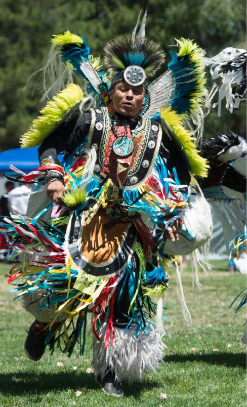 Rick Egan  |  The Salt Lake Tribune
Roger Benally, Navajo Nation, dances in the Days of '47 Pow Wow, at Liberty Park on Friday.