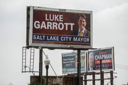 Francisco Kjolseth | The Salt Lake Tribune
A political action committee formed by Reagan Outdoor Advertising is putting up billboards of opponents to Mayor Ralph Becker. First they put them up for Jackie Biskupski. Now they're putting them up for Luke Garrott, George Chapman and Dave Robinson. On 900 South between State and Main billboards for Luke Garrott and George Chapman can be seen close together.