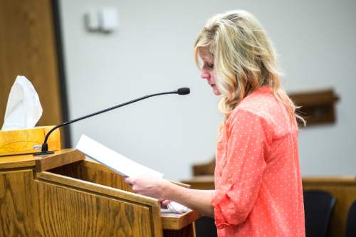 Chris Detrick  |  The Salt Lake Tribune
 Ann Curtis speaks during the sentencing of Meagan Grunwald at 4th District Court in Provo Wednesday July 8, 2015.  Eighteen-year-old Meagan Grunwald was sentenced Wednesday to 25 years to life in prison for being an accomplice to the murder last year of Utah County Sheriff's Sgt. Cory Wride and the attempted murder of Deputy Greg Sherwood.