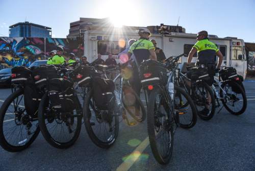 Francisco Kjolseth | The Salt Lake Tribune
Bike cops with the Salt Lake Police Department begin their work on the graveyard shift as they gather for a briefing before their patrol of the Pioneer Day parade route.
