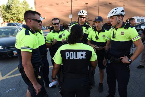 Francisco Kjolseth  |  The Salt Lake Tribune
Bike cops get briefed with the Salt Lake Police Department get briefed before the start of their patrol the night before the start of the Pioneer Day parade.