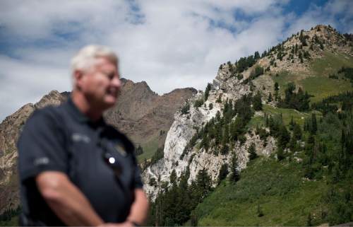 Lennie Mahler  |  The Salt Lake Tribune
UPD detective Ken Hansen speaks to the media about remains found in the Hellgate Cliffs area, pictured, of Little Cottonwood Canyon on Thursday. Climbers initially found a boot containing skeletal remains of a foot, which could have been on the cliffside for two to three years. Hansen said investigators are confident they will be able to link the remains to a missing person through DNA analysis.