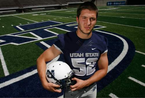Scott Sommerdorf   |  The Salt Lake Tribune

USU LB Kyler Fackrell at Romney Stadium in Logan, Thursday, August 1, 2013.