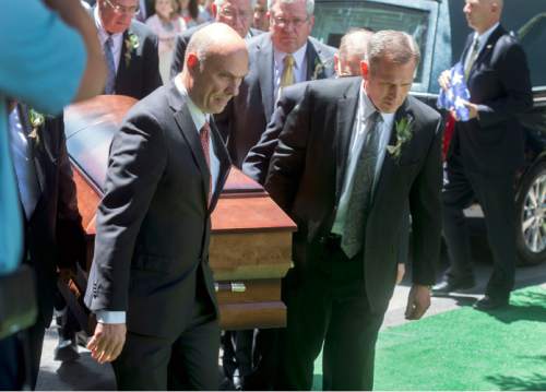 Steve Griffin  |  The Salt Lake Tribune


Pallbearers carry the casket of LDS apostle Boyd K. Packer during graveside services at the Brigham City Cemetery following funeral service in Salt Lake City, Friday, July 10, 2015.