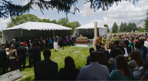 Steve Griffin  |  The Salt Lake Tribune


Kenneth Packer dedicates the grave of his father, LDS apostle Boyd K. Packer, during graveside services at the Brigham City Cemetery following funeral service in Salt Lake City, Friday, July 10, 2015.
