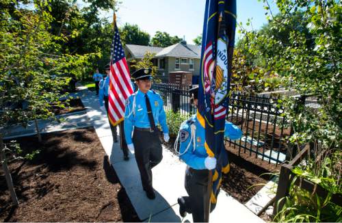 Steve Griffin  |  The Salt Lake Tribune


Members of the SLPD Explorer Honor Guard retire the Colors during dedication program for the Ron Heaps Memorial Park in Salt Lake City, Thursday, July 30, 2015.  Heaps, a Salt Lake City police officer  was shot and killed while investigating a suspicious person complaint in Salt Lake City in 1982.
