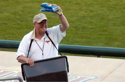 Rick Egan  |  The Salt Lake Tribune

Paul Watson works the crowd at Franklin Covey Field in Salt Lake City as he sells "happy peanuts - two for $5) at the Salt Lake Stingers game, Thursday, May 15, 2003.