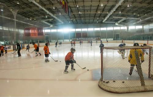 Rick Egan  |  The Salt Lake Tribune

Participants in a kids hockey camp work out on the ice in the Olympic Oval in Kearns, Friday, July 17, 2015.