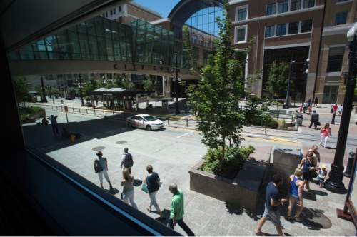 Steve Griffin  |  The Salt Lake Tribune


Pedestrians make their way along Main Street between 100 south and West Temple in Salt Lake City, Friday, July 31, 2015.  A University of Utah study of downtown Salt Lake City, block by block, shows that pedestrian traffic is significantly boosted by engaging urban design, such as windows overlooking sidewalks, uniform building setback, courtyards, outdoor dining and unique details that give buildings character.