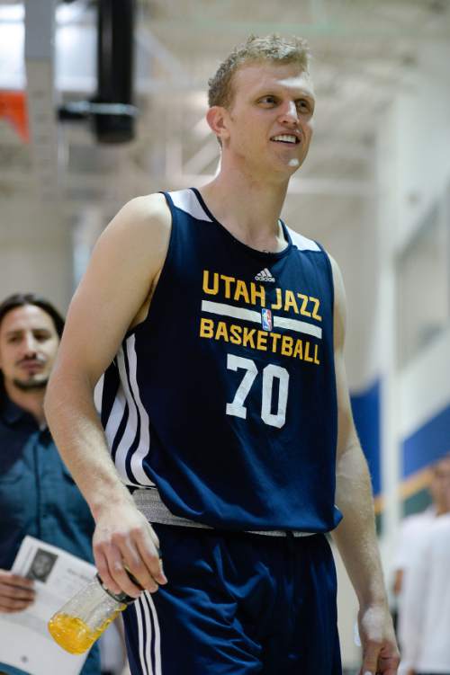 Francisco Kjolseth  |  The Salt Lake Tribune
BYU's all-time leading scorer, Tyler Haws, gets ready to speak with the media following a work out for the Jazz on Monday June 1, 2015, along with five other players.