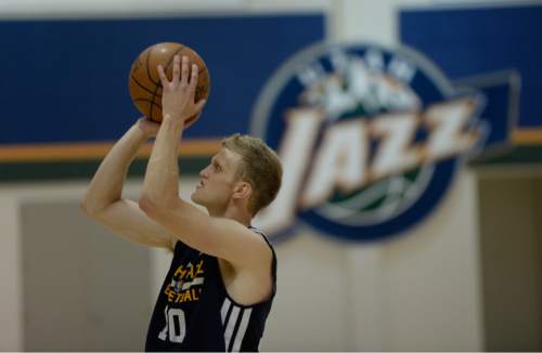 Francisco Kjolseth  |  The Salt Lake Tribune
BYU's all-time leading scorer, Tyler Haws, takes a few shots after speaking with the media following a work out for the Utah Jazz on Monday June 1, 2015, along with five other players.