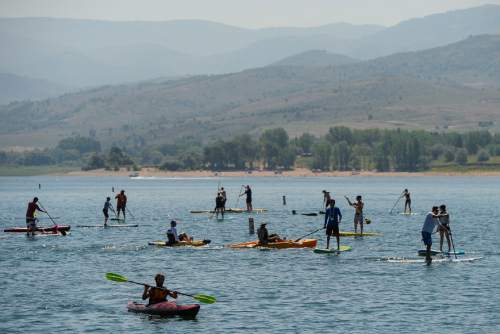 Francisco Kjolseth | The Salt Lake Tribune
Outdoor Retailer Summer Market kicks off with demo day at Pineview Reservoir's Cemetery Point in Huntsville on Tuesday, Aug. 4, 2015. Many of the manufacturers who will be at Summer Market use the opportunity to let retailers try their products, from paddle boards, canoes, kayaks and other water recreation gear.