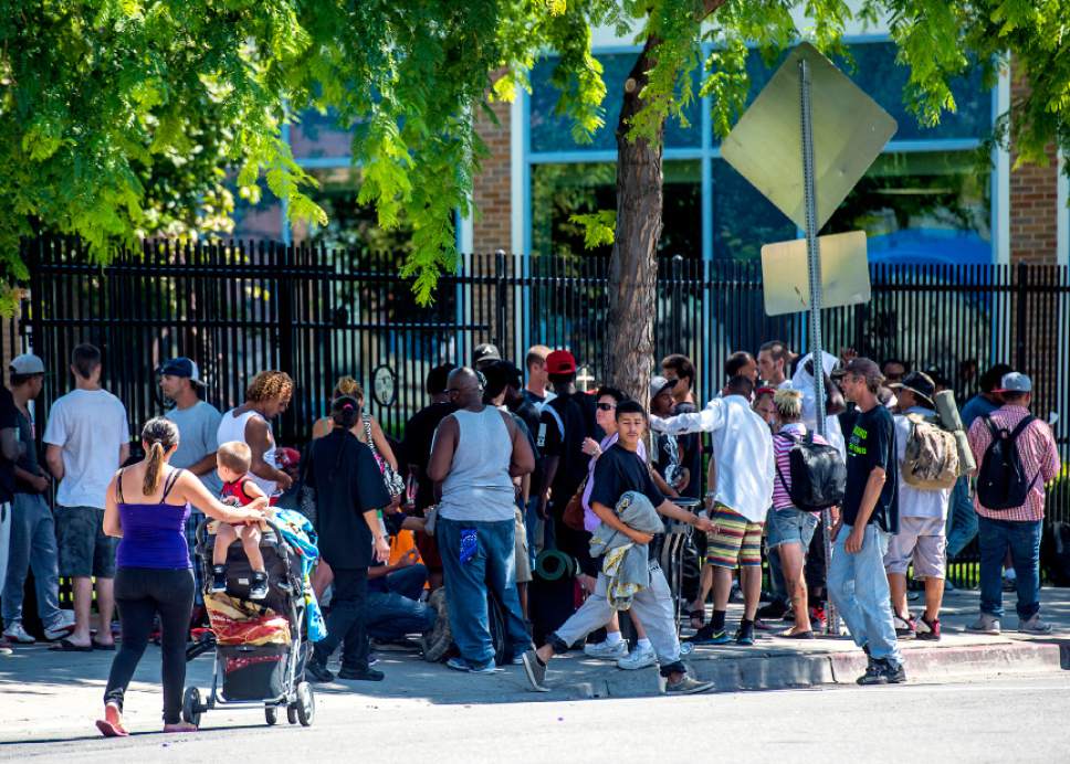 Chris Detrick  |  The Salt Lake Tribune
Homeless men and women congregate outside the Bishop Weigand Homeless Day Center in Salt Lake City Tuesday August 4, 2015.