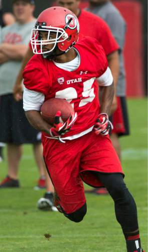 Steve Griffin  |  The Salt Lake Tribune


University of Utah running back Monte Seabrook sprints into open ground after catching a pass out of the backfield during second day of the teams fall camp at the University of Utah baseball field  in Salt Lake City, Friday, August 7, 2015.