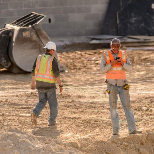 Trent Nelson  |  The Salt Lake Tribune
Workers from Phaze Concrete on the construction site of the new Rawlins High School in Rawlins, Wyoming, Tuesday June 30, 2015.