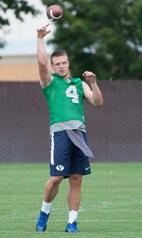 Leah Hogsten  |  The Salt Lake Tribune
Quarterback Taysom Hill  during Brigham Young University's first practice of fall football camp, August 8, 2015.