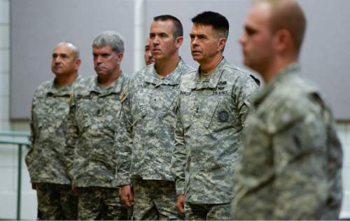 Francisco Kjolseth | The Salt Lake Tribune
State Adjutant General MG Jefferson S. Burton, second from right, is joined by other leaders as Camp Williams hosts the departure ceremony for 26 Soldiers of the Utah Army National Guard's 19th Special Forces (Airborne) on Monday, Aug. 10, at the Scott Lundell Readiness Center auditorium. The mission of these Soldiers is to provide operational support to coalition forces involved in support of Operation Inherent Resolve in Afghanistan during a 12-month deployment.