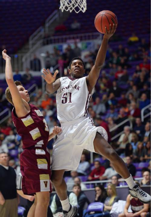 Steve Griffin  |  The Salt Lake Tribune

Lone Peak's Christian Popoola (51) floats to the basket during quarterfinals of the boy's 5A basketball state tournament game against  Viewmont at the Dee Event Center in Ogden, Wednesday, February 25, 2015.