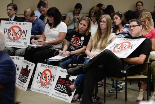 Francisco Kjolseth | The Salt Lake Tribune
People opposed to moving the prison attend the meeting by the Prison Relocation Commission at the Utah Capitol on Tuesday, Aug. 11, 2015, that in the end picked the site in Salt Lake.