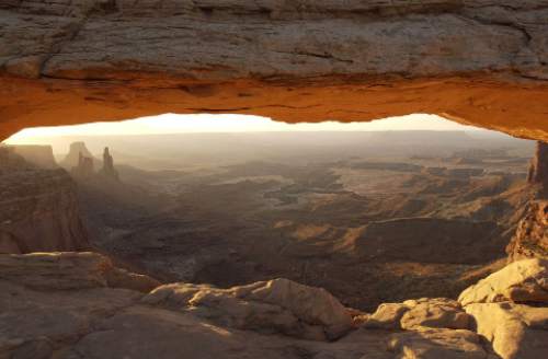 Trent Nelson  |  Tribune File Photo

The view at sunrise from Mesa Arch, in the Island in the Sky district of Canyonlands National Park.