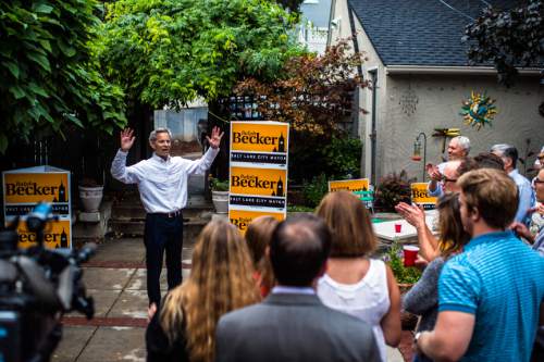 Chris Detrick  |  The Salt Lake Tribune
Salt Lake City Mayor Ralph Becker talks to friends and supporters at his home in Salt Lake City Tuesday August 11, 2015.