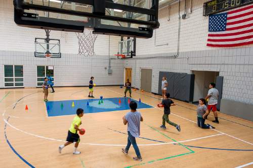Trent Nelson  |  The Salt Lake Tribune
Children play dodgeball at the Sorenson Multicultural Center, Thursday August 13, 2015, as part Salt Lake City's YouthCity summer program for kids.