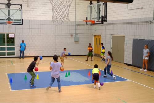 Trent Nelson  |  The Salt Lake Tribune
Children play dodgeball at the Sorenson Multicultural Center, Thursday August 13, 2015, as part Salt Lake City's YouthCity summer program, which recently expanded to the west side.