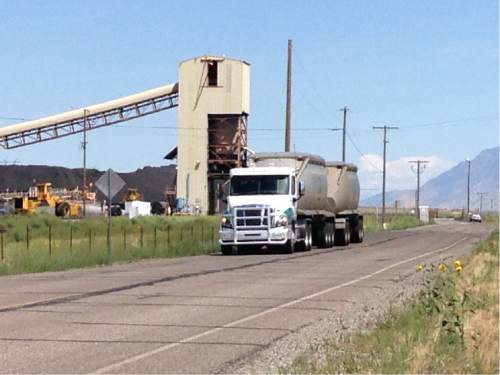 Lee Davidson  |  The Salt Lake Tribune 

Coal trucks arriving at a railroad siding near Levan. A proposed $124 million railroad from Salina to Levan could eliminate heavy shipments by truck of coal from the Sufco mine.