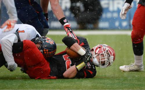Francisco Kjolseth  |  The Salt Lake Tribune
Hunter Johnson (23) of American Fork is taken down by the Brighton defense in Class 5A state football semifinal at Rice Eccles Stadium on Thursday, Nov. 13, 2014.