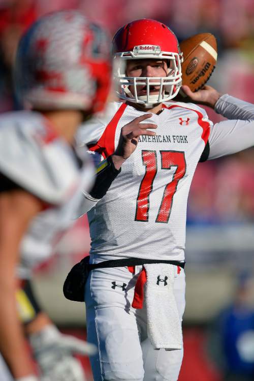 Chris Detrick  |  The Salt Lake Tribune
American Fork's Tanner Smith (17) looks to pass the ball during the 5A state championship game at Rice-Eccles Stadium Friday November 21, 2014.