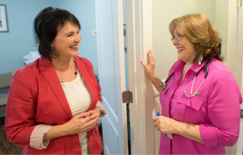 Rick Egan  |  The Salt Lake Tribune
Holly Green, left, visits with Jody Stubler at the Hope Family Medical Center. Stubler is a nurse practitioner who provides health care to people with low and moderate income who lack insurance or have skimpy insurance plans.