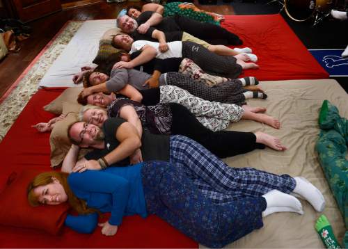 Scott Sommerdorf   |  The Salt Lake Tribune
One of the first exercises the group did was this "spoon train" during "cuddle party" - a regular meet-up that happens in Utah, where strangers get together and cuddle in a nonsexual way last month.
